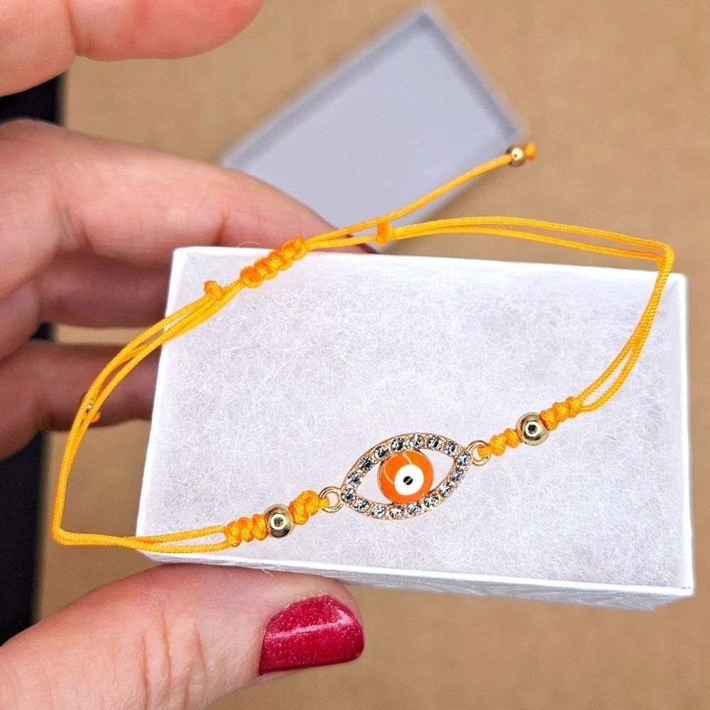 Orange adjustable evil eye string protection bracelet